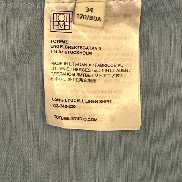 TOTÊME Oversized Tencel™ Lyocell + Linen-Blend Chambray Shirt With Chest Logo - Picture 15 of 16